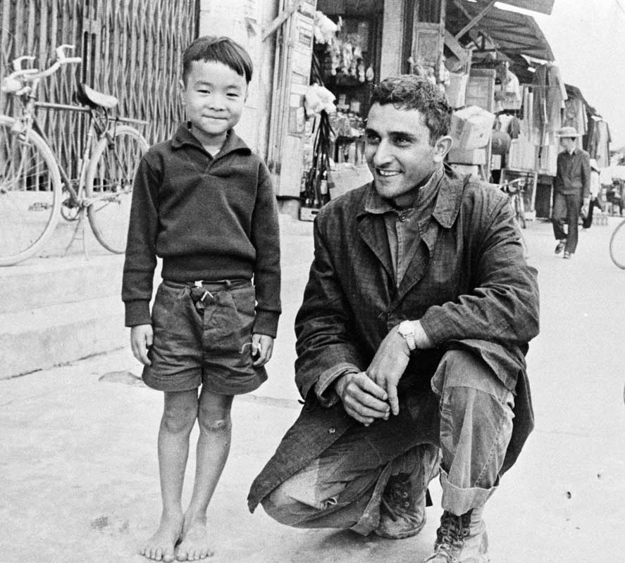 George Esper with little Vietnamese girl