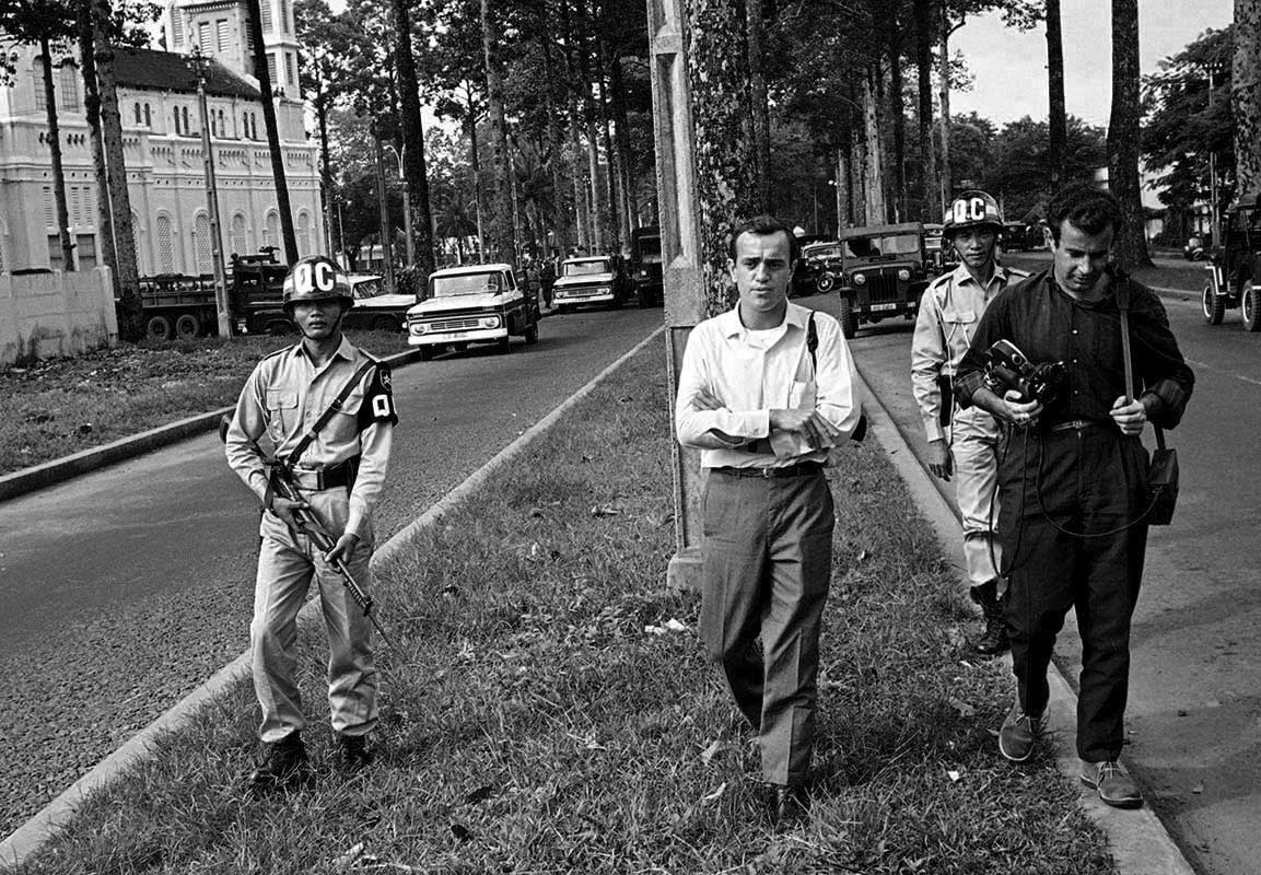 Arnett under arrest after covering Buddhist demonstration, Saigon, 1963