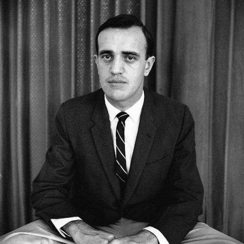 Arnett poses in formal AP publicity photograph, 1962
