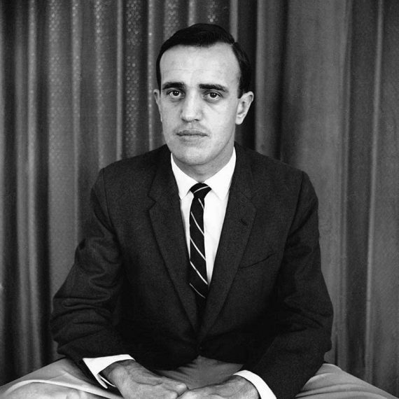Arnett poses in formal AP publicity photograph, 1962
