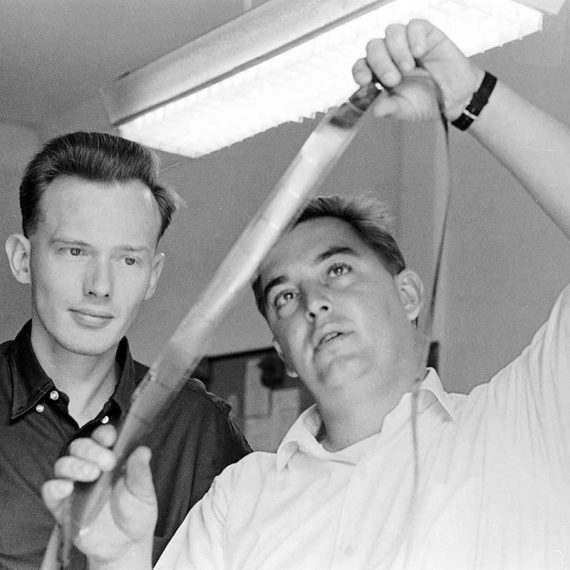Browne and Horst Faas examine film in AP’s Saigon Bureau, 1963