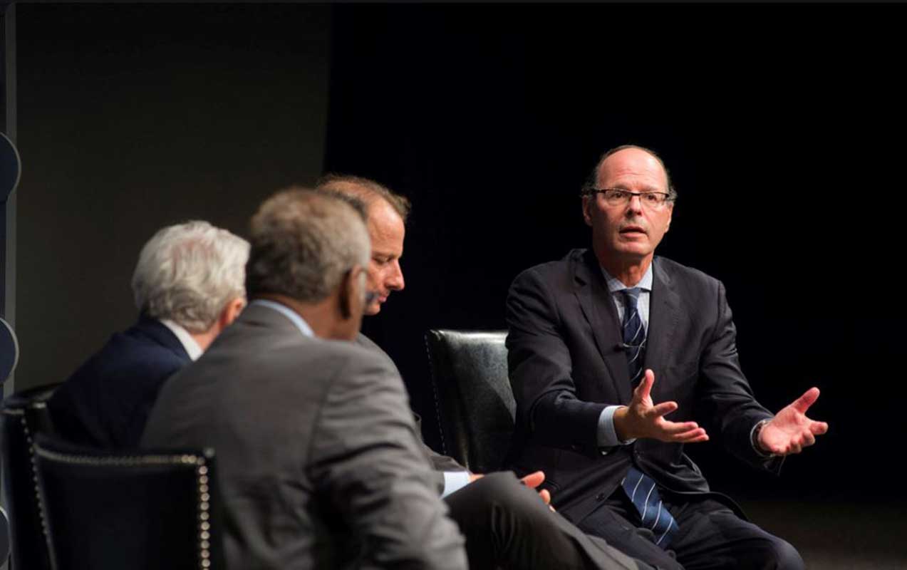 Herman discusses film with New Yorker's George Packer (center) at Newseum